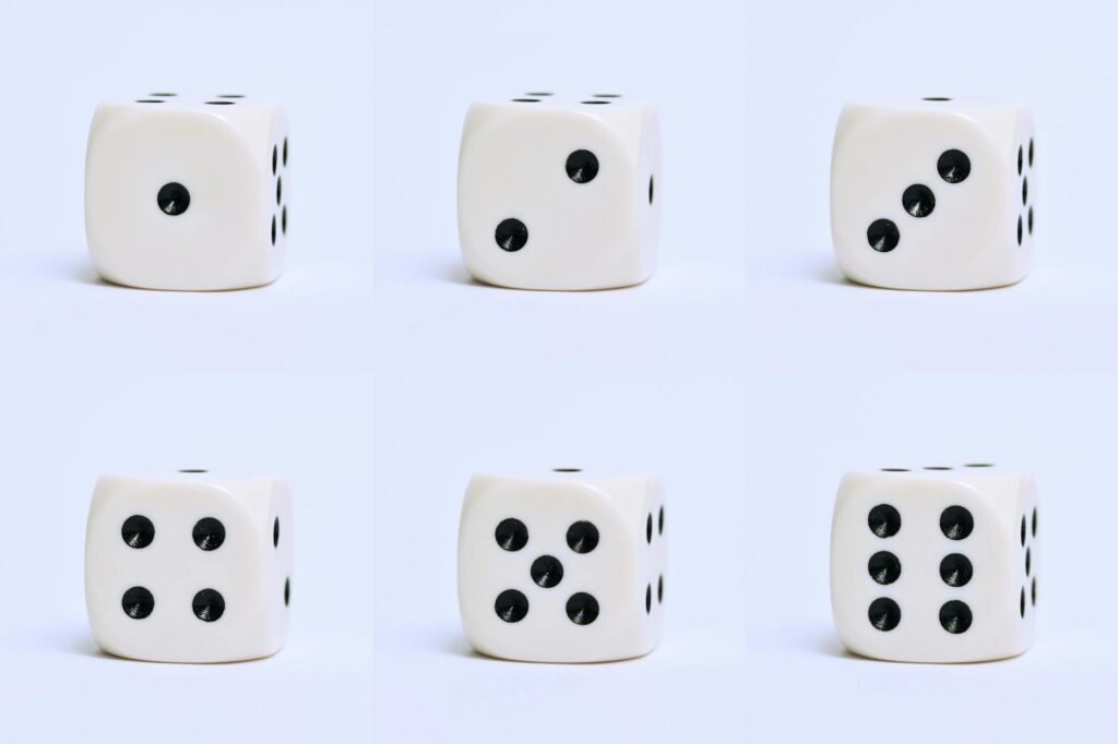 close up shot of dice on a white surface