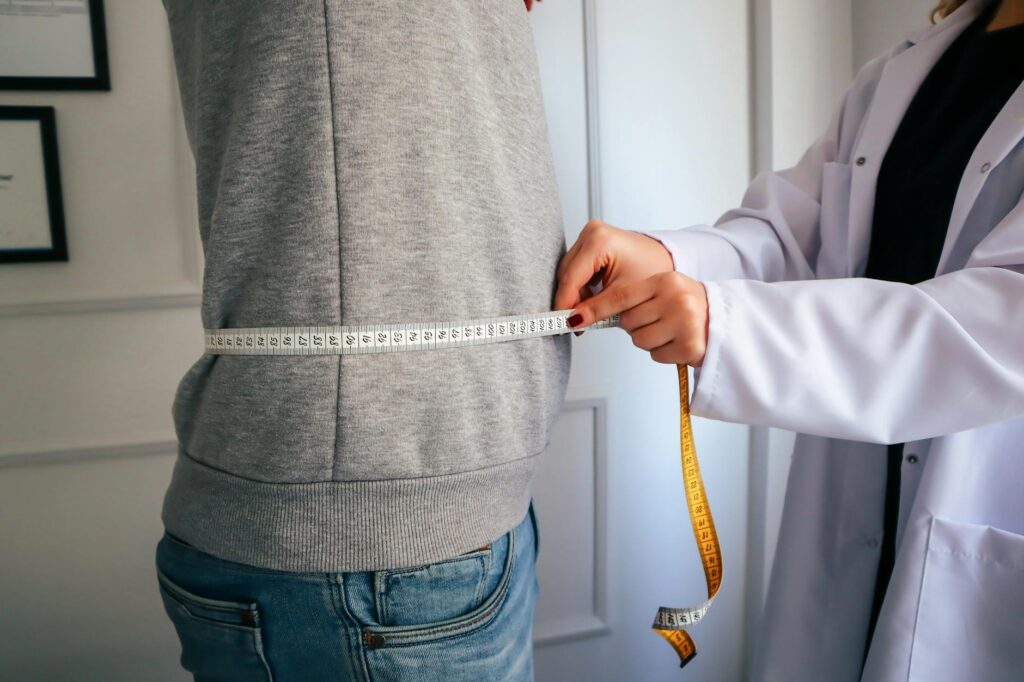 dietitian measuring waist