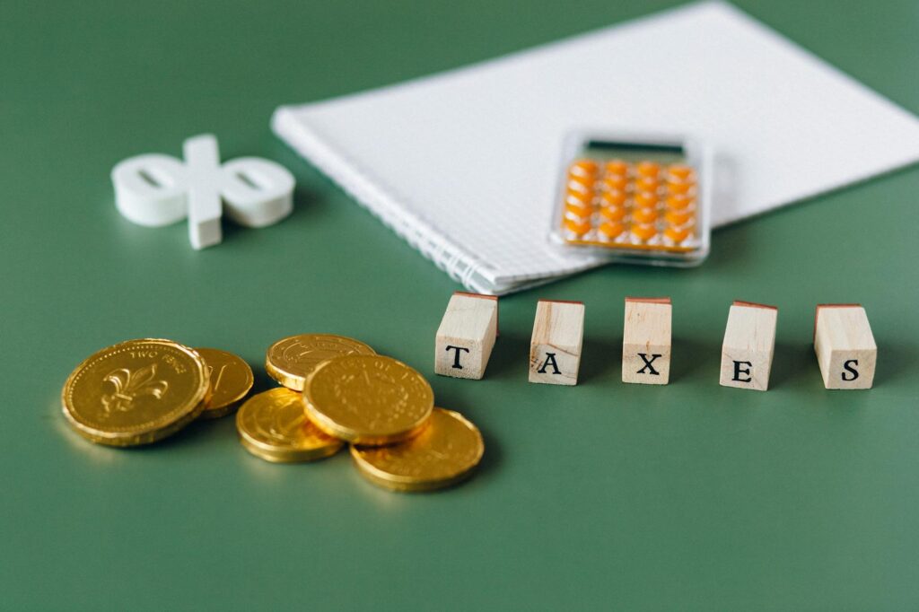 gold coins on green surface