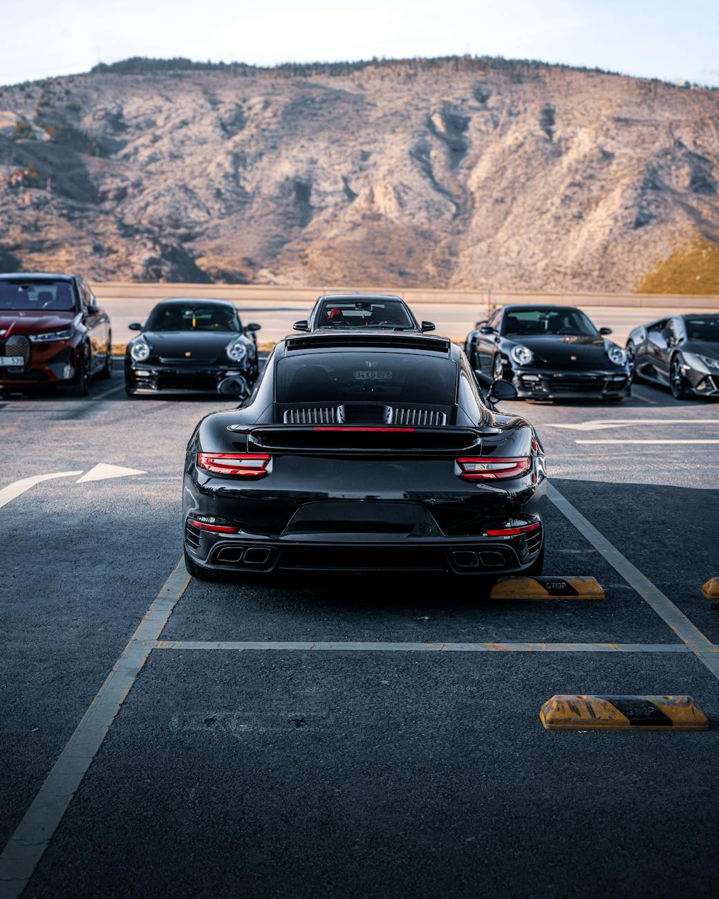 luxury cars in a scenic parking lot in ankara