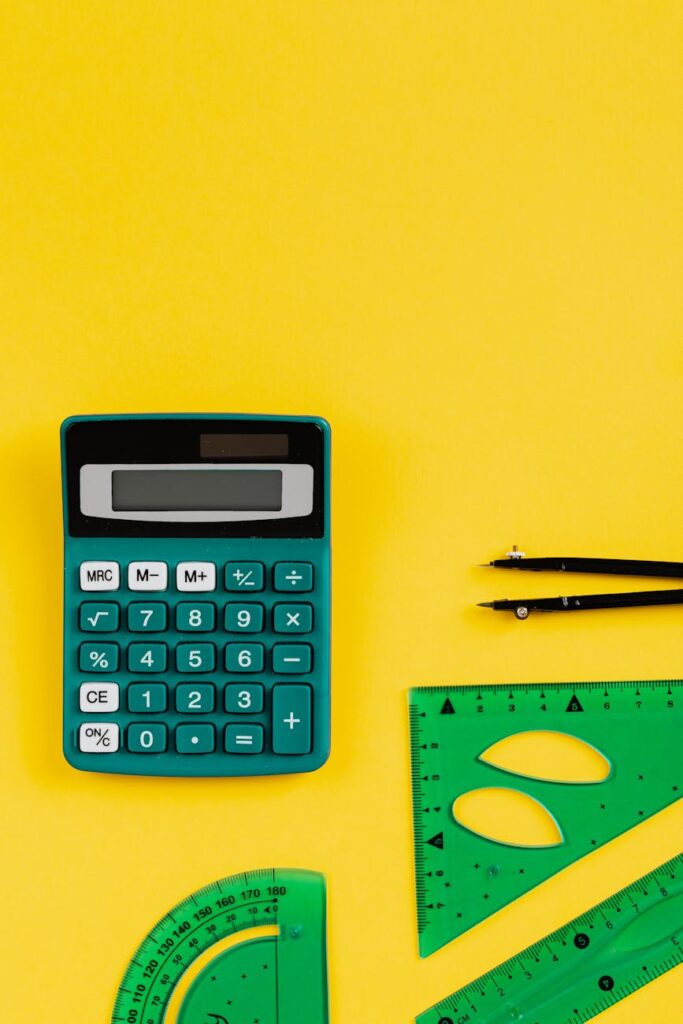 green calculator on yellow background