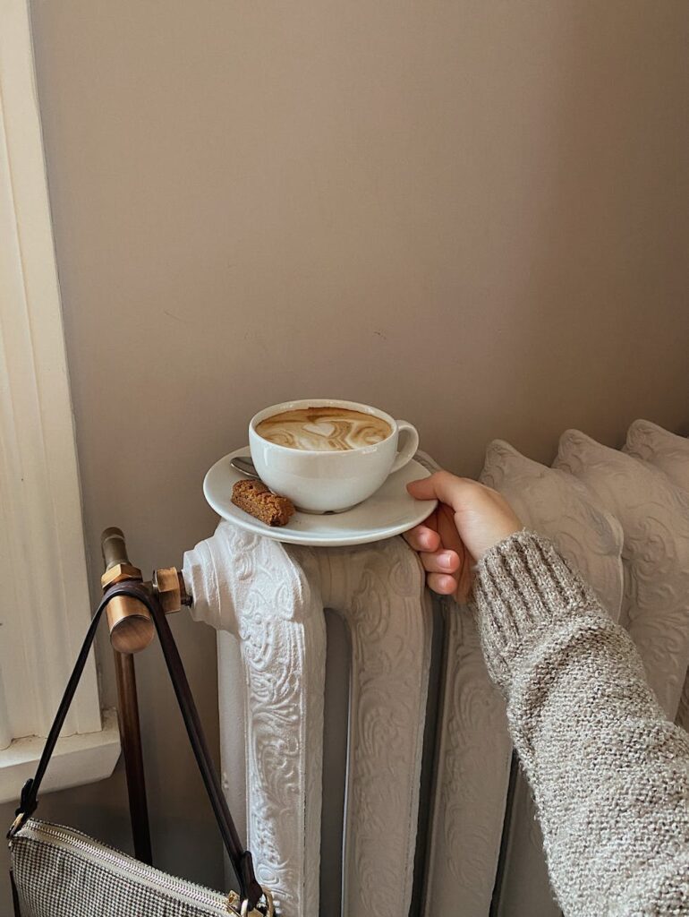 person holding a saucer