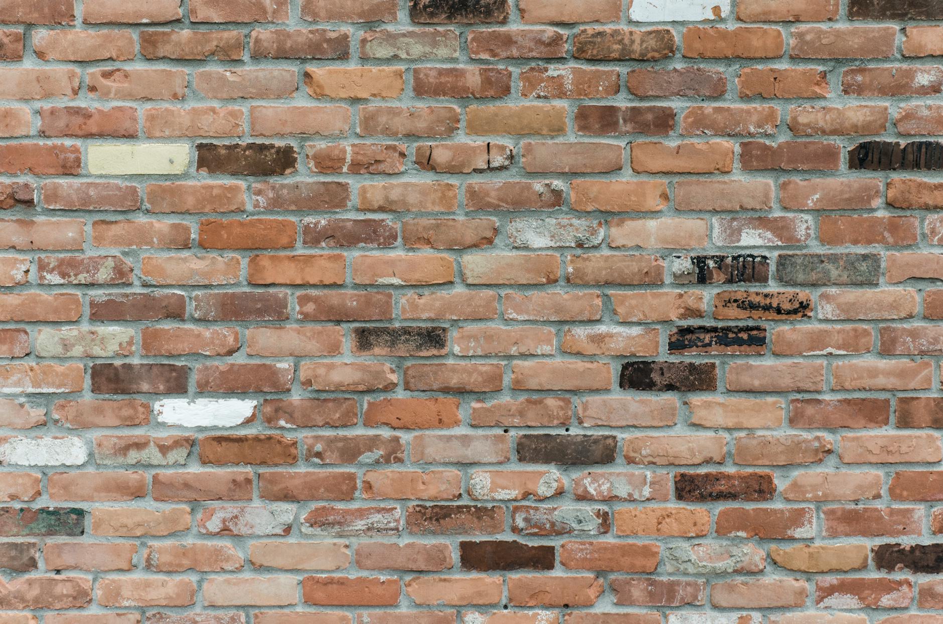 brown brick wall close up photography